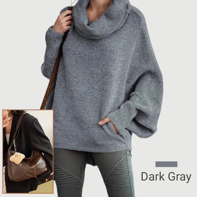 Ženski pulover z netopirskim ovratnikom in žepi