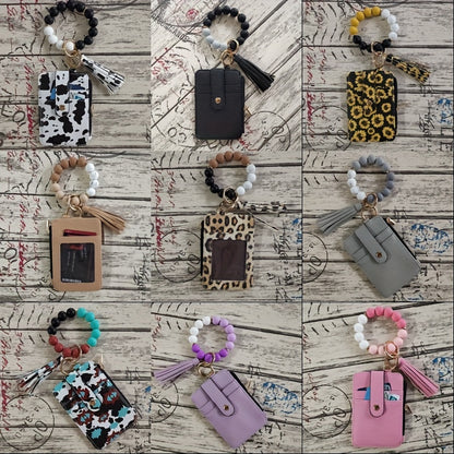 Silikonski nosilec za kartice z zapestnico in perlicami