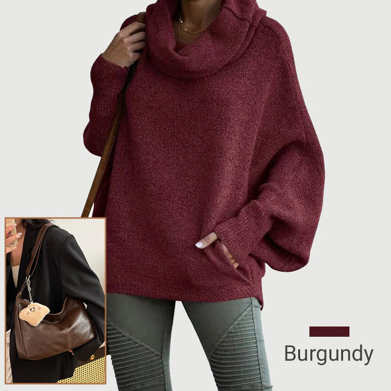 Ženski pulover z netopirskim ovratnikom in žepi