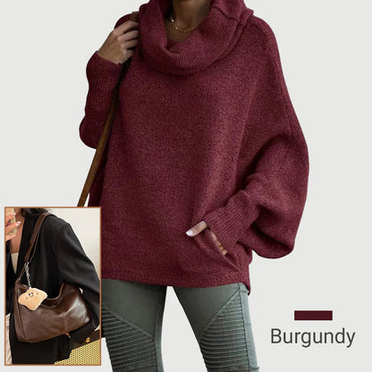 Ženski pulover z netopirskim ovratnikom in žepi