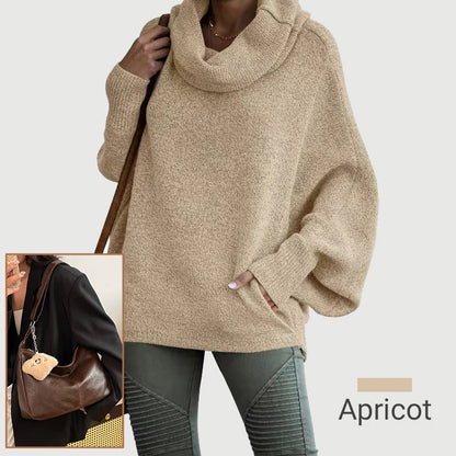 Ženski pulover z netopirskim ovratnikom in žepi