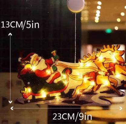 Obesite božične lučke na okna